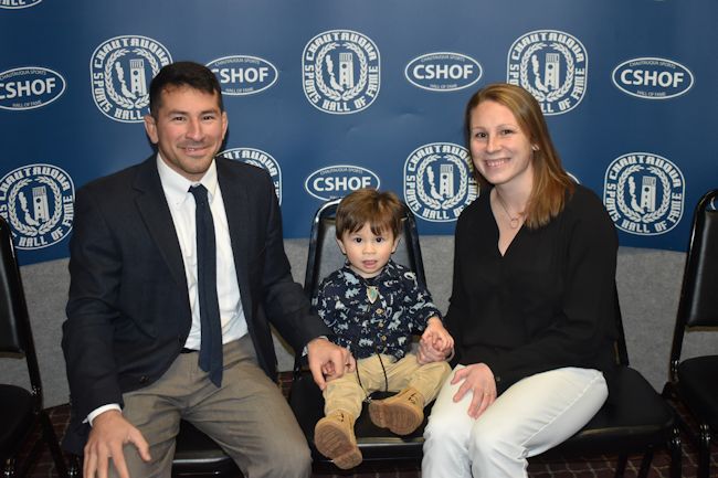 2024 inductee Carlene Sluberski is joined by her husband, Max, and son, Miles.