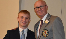  Clymer/Sherman/Panama first-team all-state football player Bryce Hinsdale and CSHOF president Randy Anderson.