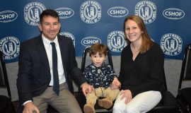 2024 inductee Carlene Sluberski is joined by her husband, Max, and son, Miles.