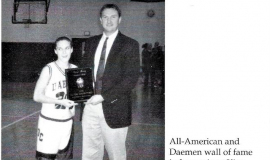 Amy King receiving all-time steals leader award.