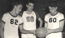 Bill Present (center) with Cleveland Browns players Cliff Lewis (left) and Otto Graham (right). Circa 1949. Bill was a player on the Jamestown Vikings basketball team that played an exhibition game against the Browns in Jamestown.