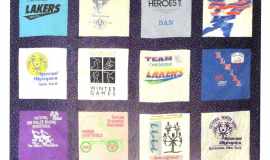 Quilt made of Daniel Bryner's T-shirts commemorating his events.