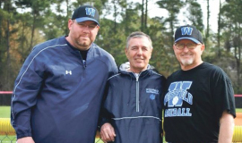 Doug Kaltenbach, right, pictured with assistant coaches Dan Martin, left and Don Mansfield, center.