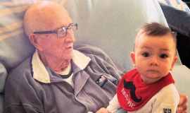 Doc Malinoski holding his great-grandson Ian in February 2014, five months before Doc passed away.
