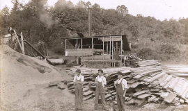 Howard Ehmke (left) and his brother Charlie (right) at a saw mill in Silver Creek circa 1910.