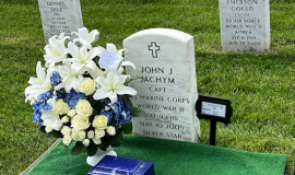Photo taken by Jim Jachym at Arlington National Cemetery of his mother's (Arlene) ashes being laid to rest with her husband John.