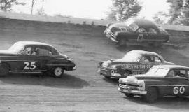 George Hartley in the #60 1950 Mercury in NASCAR action at Dayton, OH Speedway. #25 is Dick Linder. The car next to George Hartley is the great Curtis Turner.