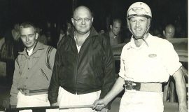 Left to right, mechanic Jim Fardink, owner Julian Buesink, and driver Freddy Knapp after a win at Stateline on July 30, 1966.