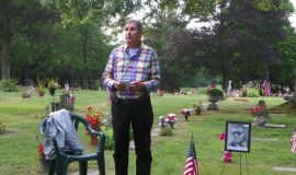 Bruce Widen at Tony LeVoie's gravesite.