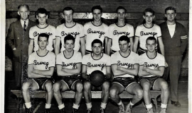 Oswego High School basketball, 1947. Patrick Damore holding ball.