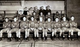 1935 Jamestown High School football team. Robert Erickson is in the middle row, second from right. Sam Hammerstrom is in front row with ball.