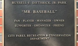 This plaque is displayed on the grandstand at Russell E. Diethrick, Jr. Park