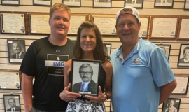 Grandson Ted, daughter Cindy Dilts, son Chris Olsen visit the CSHOF in July 2022.
