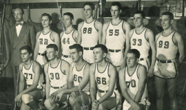 Fredonia High School basketball team. Tom Prechtl is number 55 in back row.