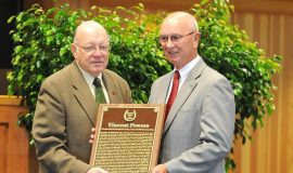 Ed Bowen presents Vincent Powers plaque to Randy Anderson.