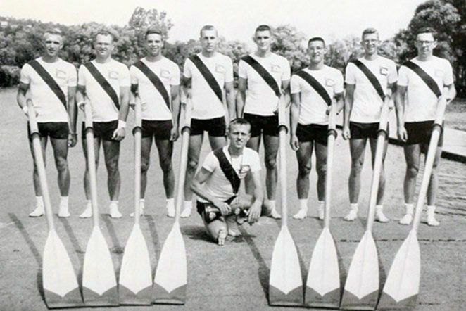 Phil Gravink, far left, stands with the 1957 Cornell University crew, holding the oar that was donated to the CSHOF.