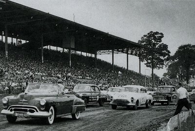 George Hartley in the #60 1950 Mercury in NASCAR action at Dayton, OH Speedway. #25 is Dick Linder. The car next to George Hartley is the great Curtis Turner.