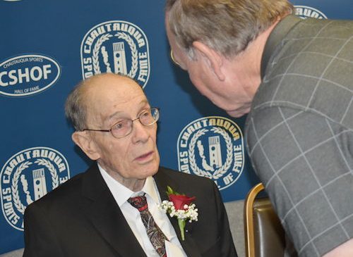Dave Kolstee, right, speaks to longtime Southern Tier official Elly Norton.