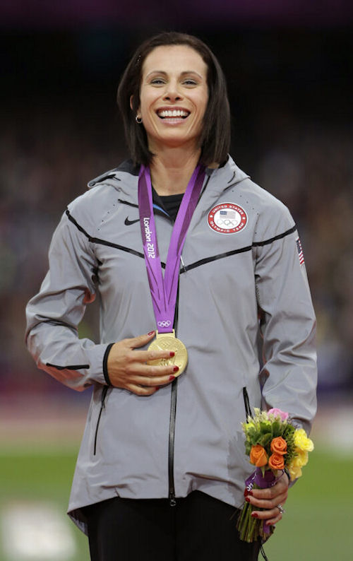 Jenn Suhr poses with her gold medal.