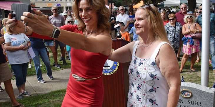 Jenn Suhr and Julie Essek pose for a selfie.