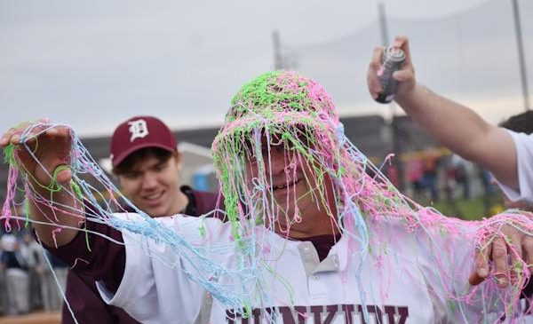 Dunkirk Marauders head coach Frank Jagoda is covered in Silly String.