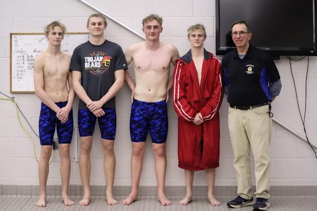 Gannon Moore, Grady Moore, Miles Moore and Brady Lindstrom are pictured with Frewsburg/Southwestern coach Bruce Johnson .