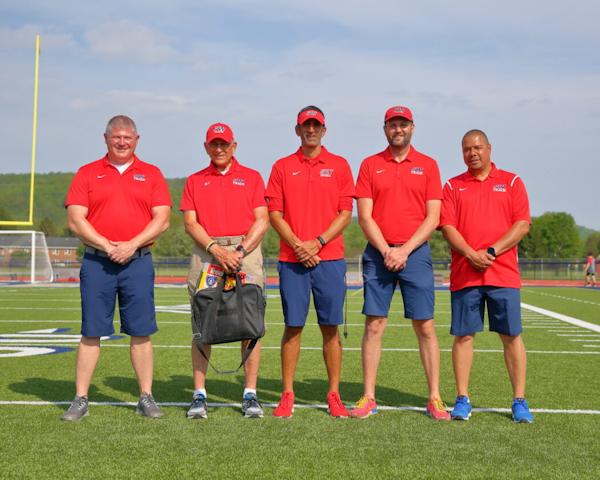 Southwestern coaches, from left: Adam Brown, assistant coach; Fran Sirianni, assistant coach; Jay Sirianni, boys head coach; Adam Frisbee, girls head coach; and Pedro Melendez, assistant coach.