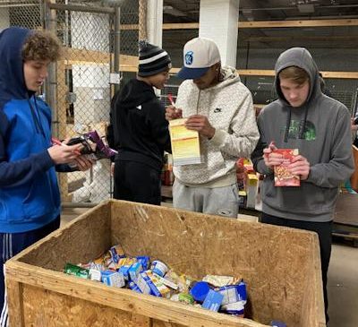 Jaiman Johnson, Braden Fuller, Jase Smith and Gage Swanson, are pictured working.