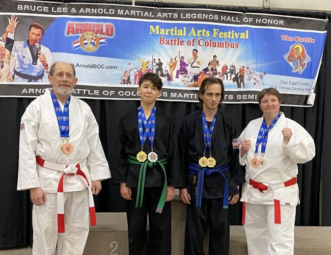 Four members of Kebort’s Karate Tigers