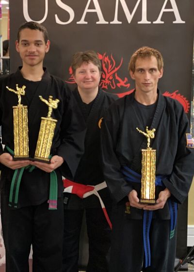 Elijah Edwards and David Gray of Kebort’s Karate Tigers, seen here with their instructor Christina Kebort.