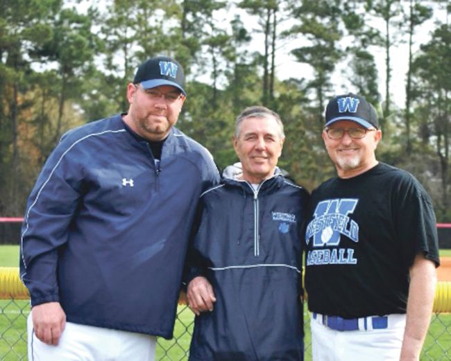 Doug Kaltenbach, right, is retiring after 30 years of coaching the Westfield Wolverines.