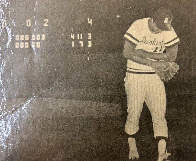 Frank Jagoda cradles his injured left arm.