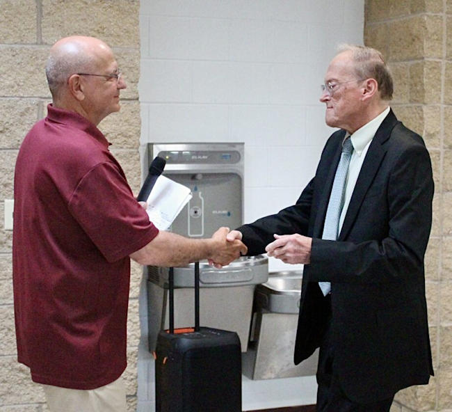 Dunkirk baseball coach Frank Jagoda, left, introduced Dan Palmer.