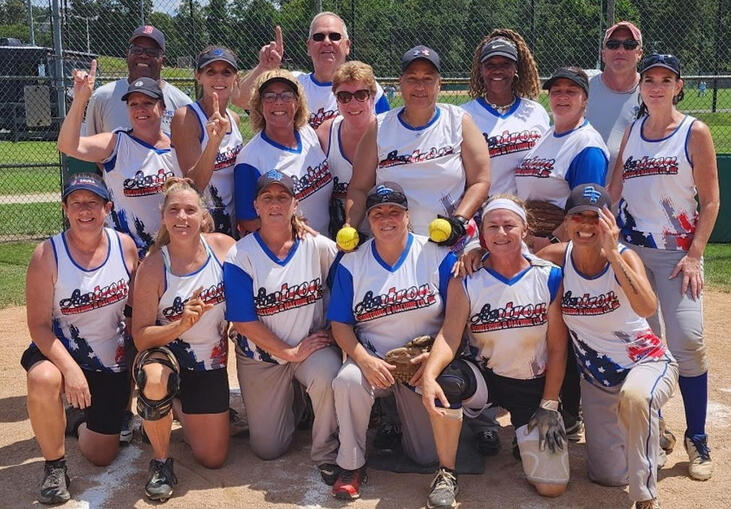 Lori Franchina is pictured with her team, Shots Fired.