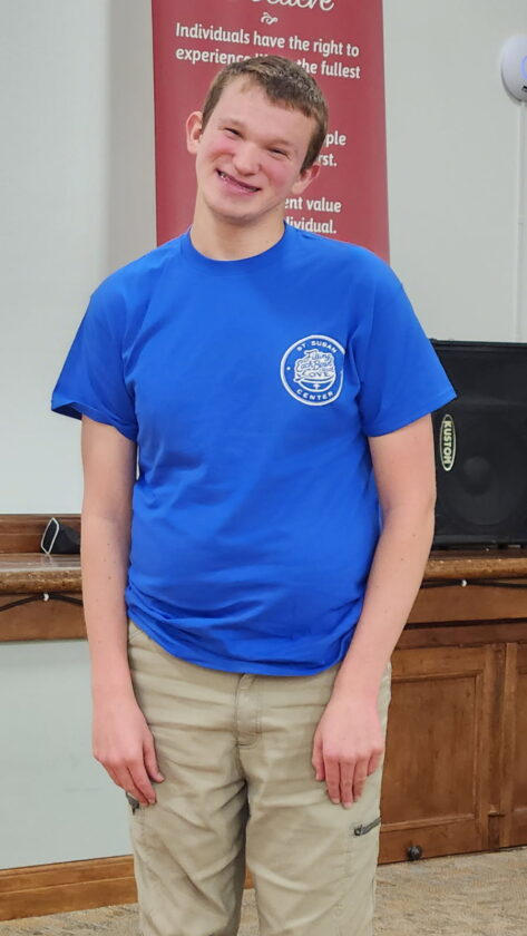 Colton Hanson wears the T-shirt St. Susan Center gave him.