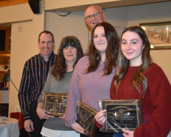 Members and coaching staff of the NYSPHSAA champion Chautauqua Lake volleyball team pose for a photo with CSHOF president Randy Anderson. Members and coaching staff of the NYSPHSAA champion Chautauqua Lake volleyball team pose for a photo with CSHOF president Randy Anderson.