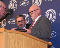 Tim D'Angelo accepts the induction of his late father, Tom, from CSHOF president Randy Anderson and banquet chairman Chip Johnson. Tim D'Angelo accepts the induction of his late father, Tom, from CSHOF president Randy Anderson and banquet chairman Chip Johnson.