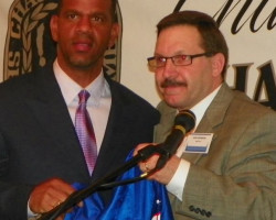 CSHOF 2012 Awards Banquet. Andre Reed and Chip Johnson. Photo courtesy Heidi Anderson. February 20, 2012. CSHOF 2012 Awards Banquet. February 20, 2012..