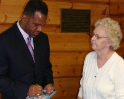 CSHOF 2012 Awards Banquet. Andre Reed signs an autograph for Lareena McArthur. Photo courtesy Heidi Anderson. February 20, 2012. CSHOF 2012 Awards Banquet. February 20, 2012.