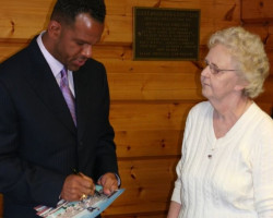 CSHOF 2012 Awards Banquet. Andre Reed signs an autograph for Lareena McArthur. Photo courtesy Heidi Anderson. February 20, 2012. CSHOF 2012 Awards Banquet. February 20, 2012.