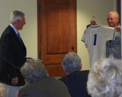 Randy Anderson presents Dick Berardino with a jersey Berardino jersey