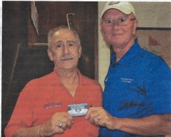 Mike LaTone receives his membership card from Randy Anderson. <em>Chautauqua Star</em>, July 3, 2015. Chautauqua-Star-7-3-2015