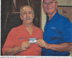 Mike LaTone receives his membership card from Randy Anderson. <em>Chautauqua Star</em>, July 3, 2015. Chautauqua-Star-7-3-2015