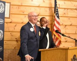 Randy Anderson shows off David Hinson's Super Bowl ring.