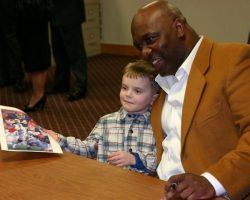 CSHOF 2010 Awards Banquet. Cole Joly with Thurman Thomas - photo courtesy of Jim Riggs. February 15, 2010. CSHOF 2010 Awards Banquet. February 15, 2010.