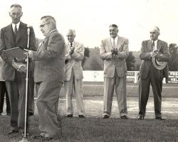 Swat Erickson is recognized by Frank Hyde as Ray Caldwell, second from right next to Hugh Bedient, far right, applaud. Swat Erickson congratulated by Frank Hyde