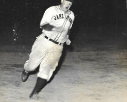 John Newman rounding third base, 1941. John Newman rounding third base, 1941.