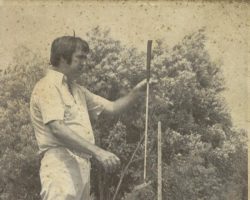 Bob Gunnell lines up a putt. Bob Gunnell lines up a putt.