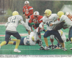 Jamestown's Aaron Leeper rushes. <em>Post-Journal</em> (Jamestown), October 23, 1999. Jamestown's Aaron Leeper rushes. October 23, 1999.