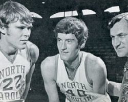 Donn Johnston, center, is seen with teammate George Karl (22) and North Carolina coach Dean Smith in a photo taken for the Tar Heels 1972-73 media guide. Donn Johnston, center, with teammate George Karl (22) and North Carolina coach Dean Smith.